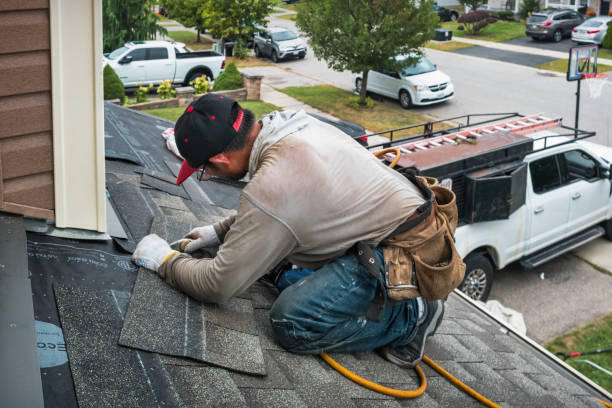 Professional Roofing technician working in Grand Haven, MI